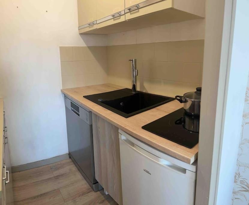 Kitchen or kitchenette, stove