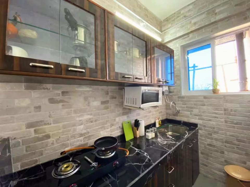 Kitchen or kitchenette, stove