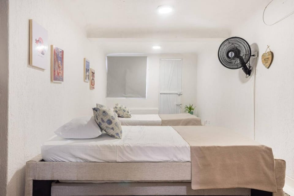 Bed, fireplace, towels