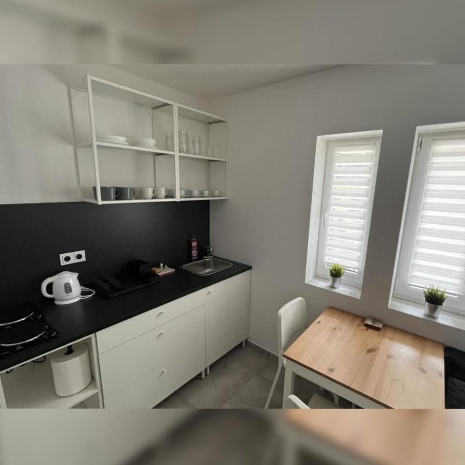 Kitchen or kitchenette, stove, kitchen