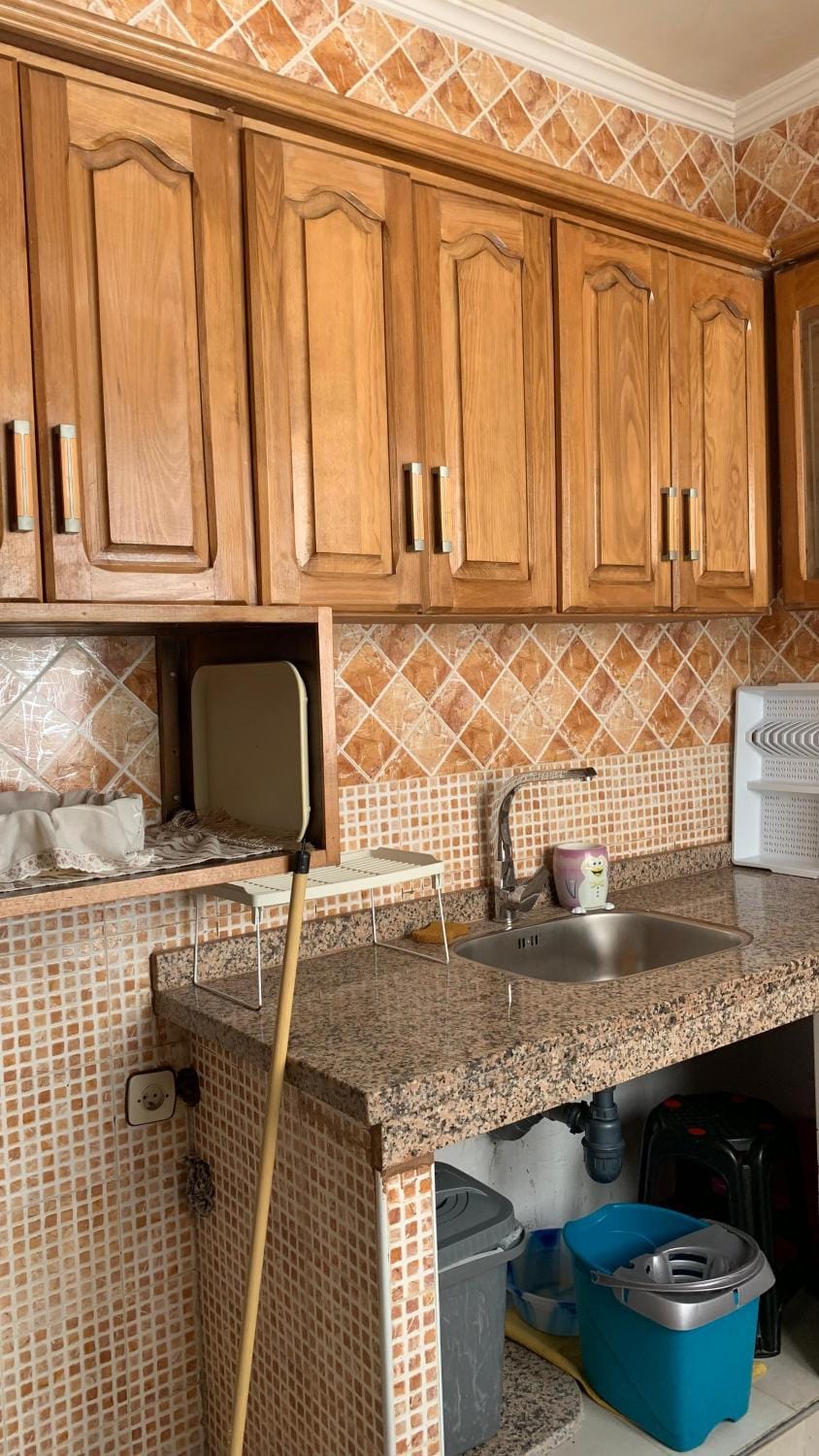 Kitchen or kitchenette, stove