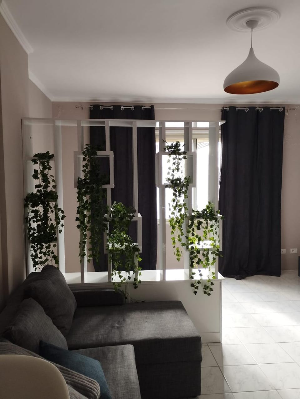 Bed, Living room, Seating area, kitchen, air conditioner