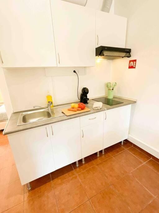 Kitchen or kitchenette, stove