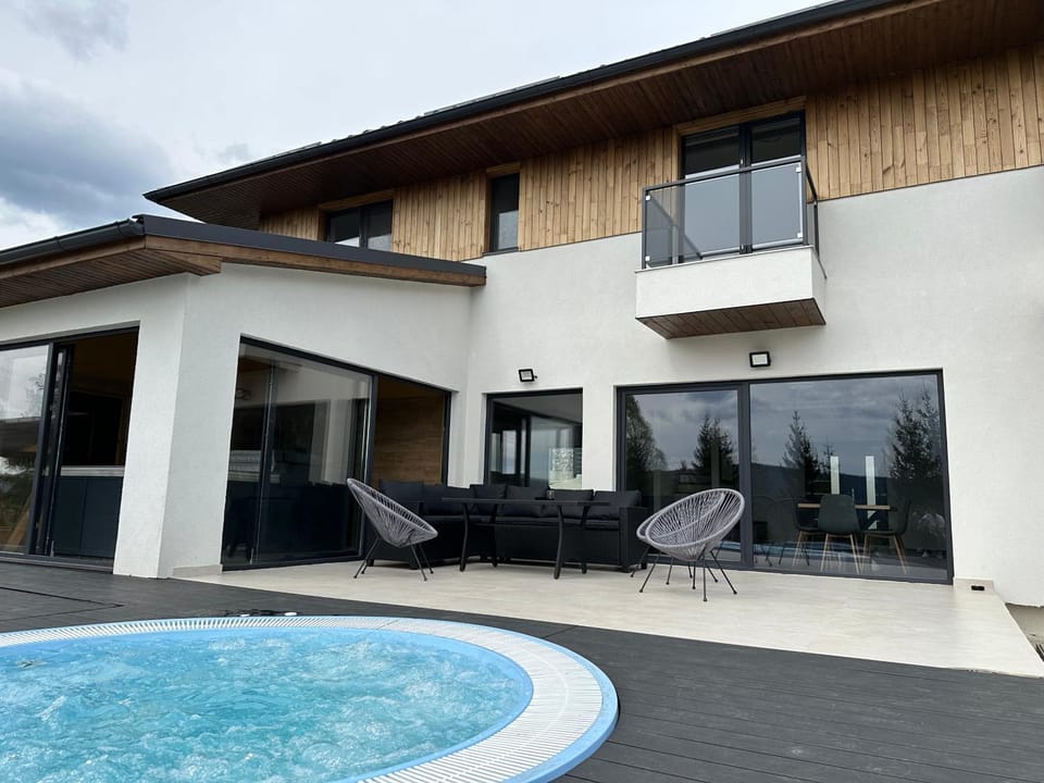 Property building, Hot Tub, Seating area, Pool view, Swimming pool