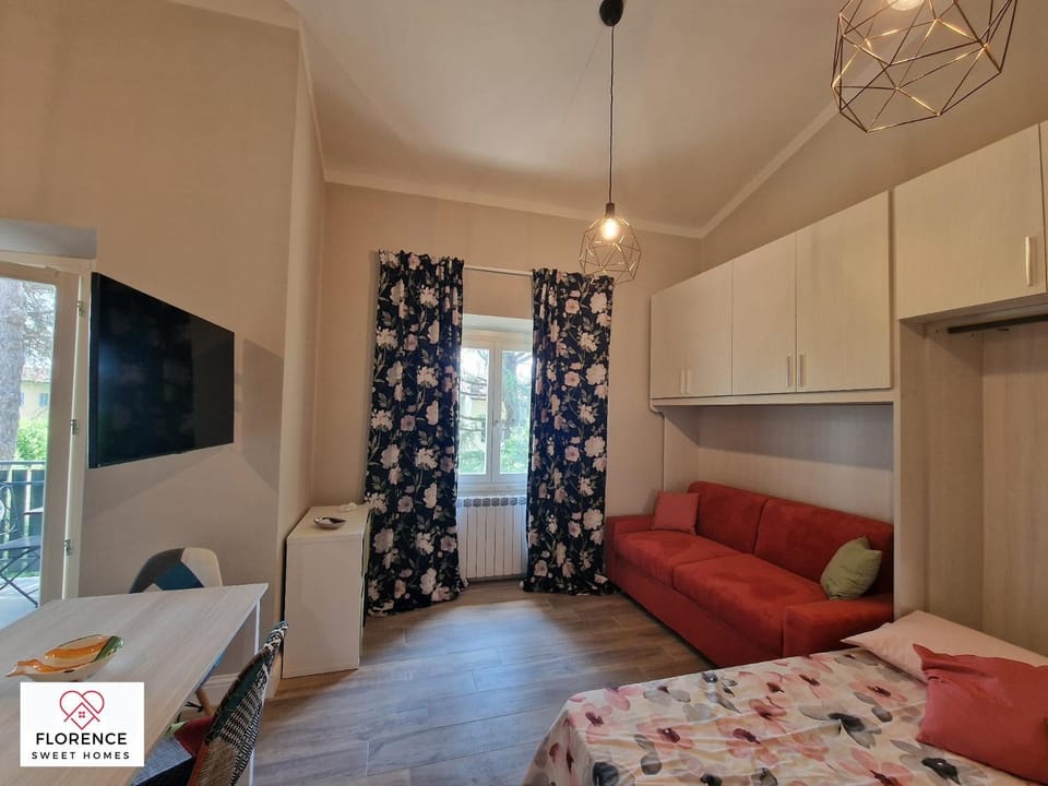Bed, TV and multimedia, Living room, Seating area, Bedroom, wardrobe