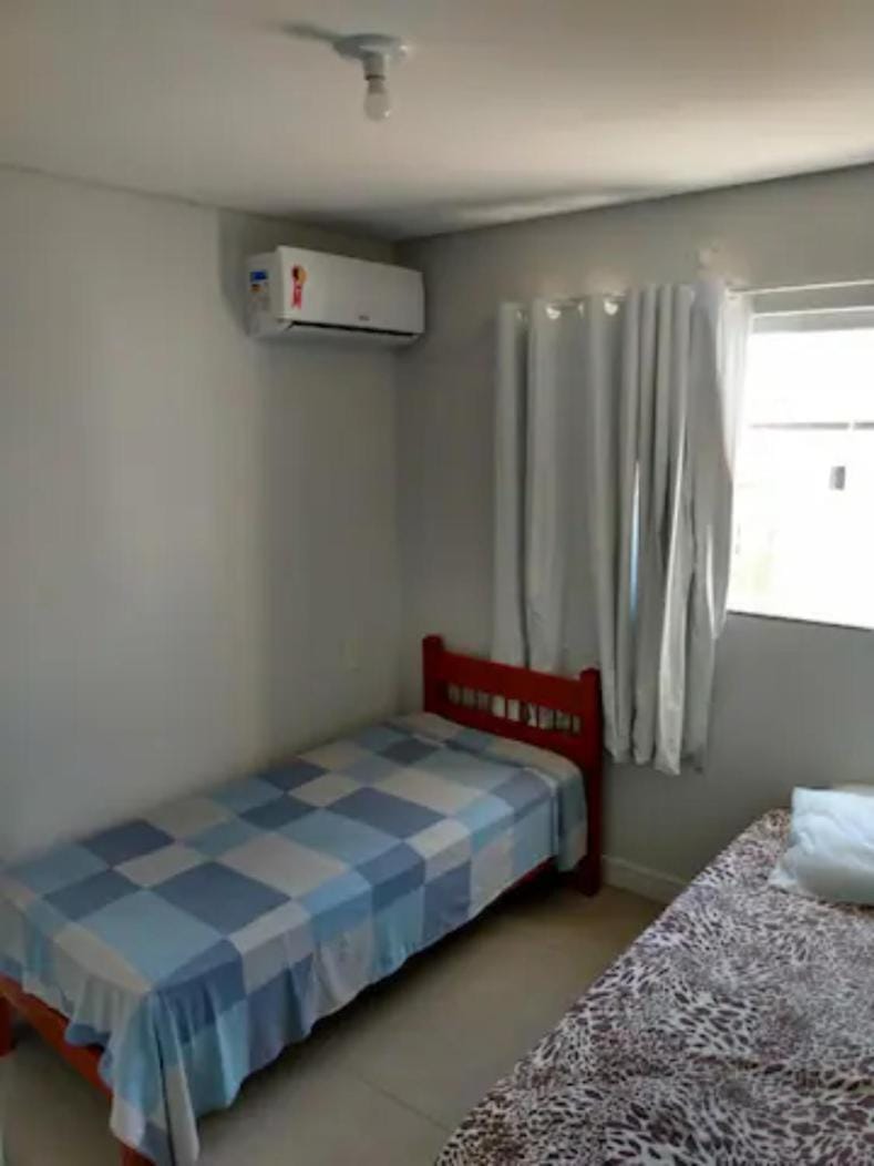 Bed, air conditioner