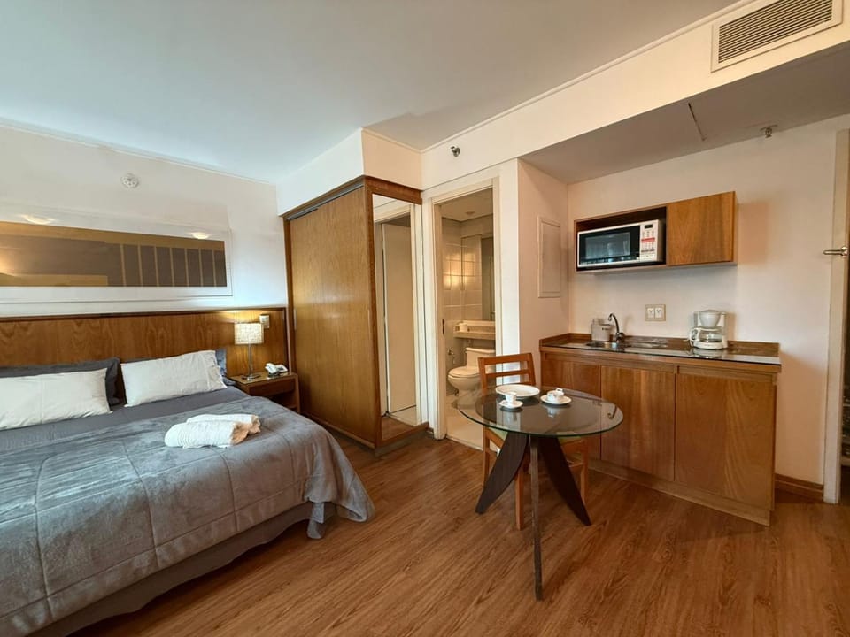 Communal lounge/ TV room, Bed, Kitchen or kitchenette, Photo of the whole room, Seating area, Bedroom, hair dresser, minibar, oven, wardrobe