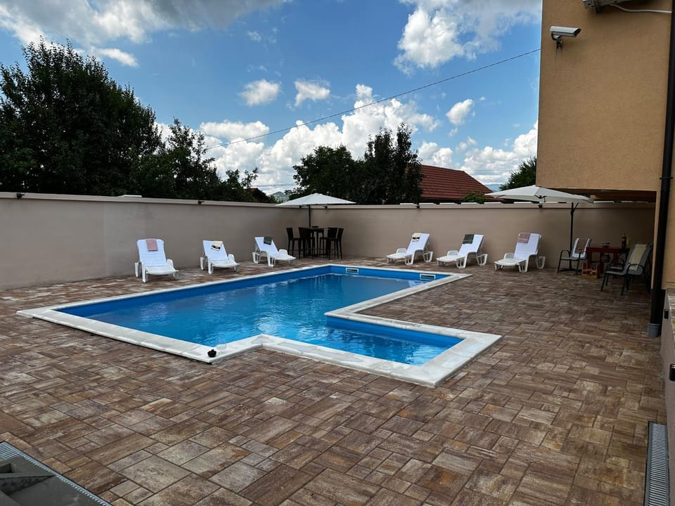 Swimming pool, sunbed