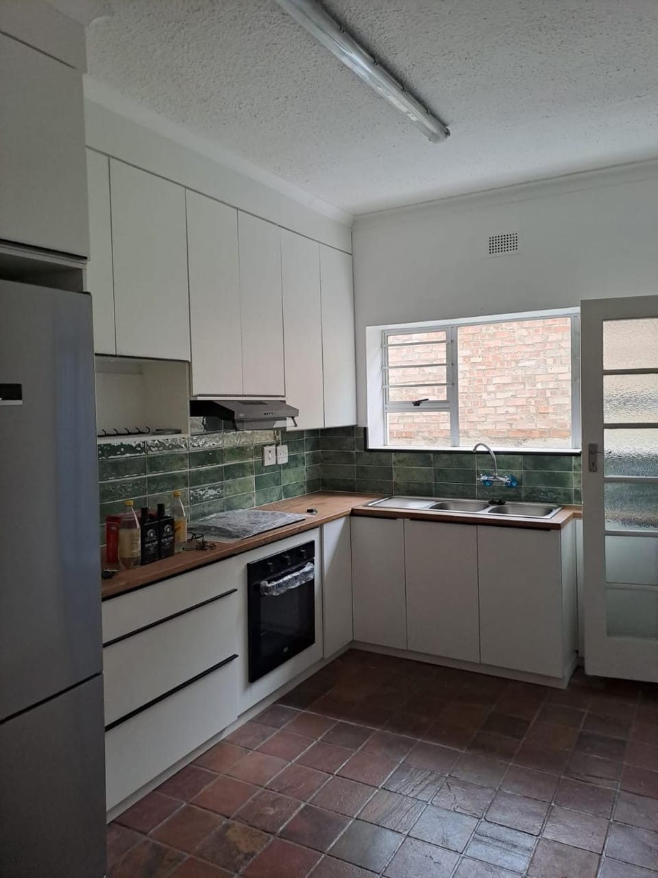 Kitchen or kitchenette, oven, stove