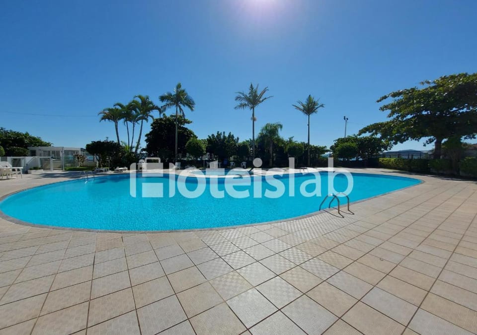Day, Text overlay, Pool view, Swimming pool, sunbed