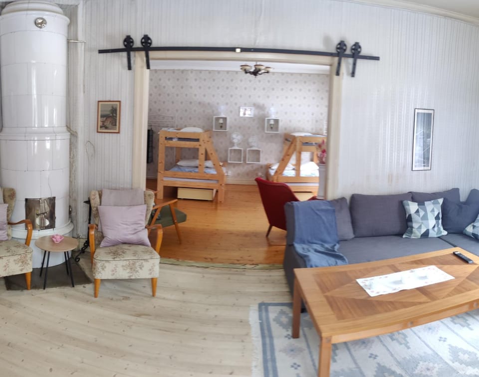 Communal lounge/ TV room, Bed, Living room, Seating area, Bedroom, bunk bed