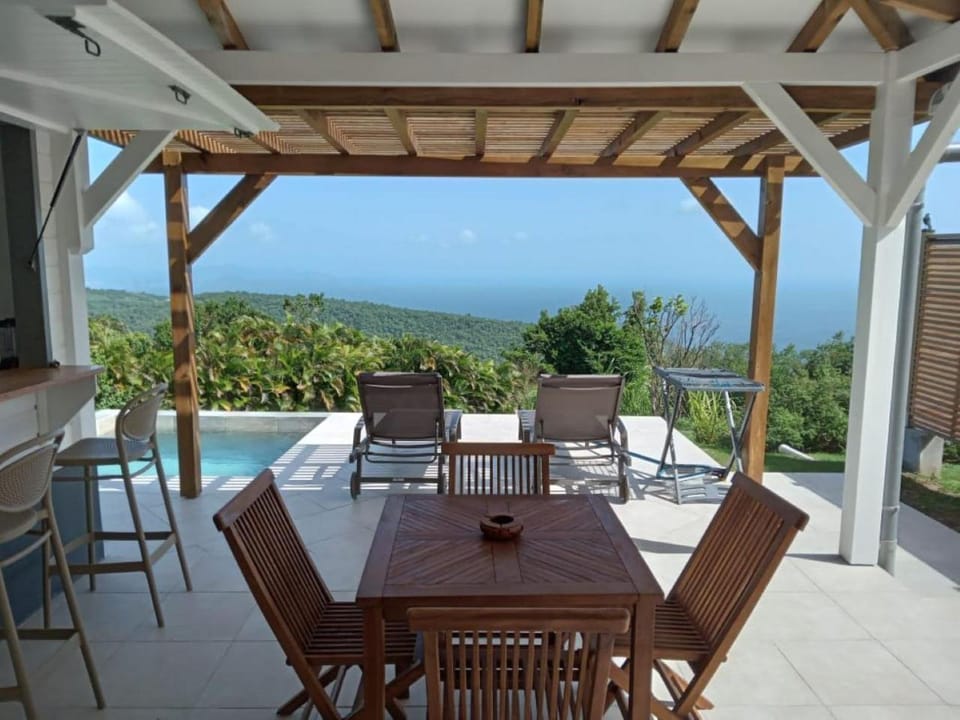 Patio, Dining area, Mountain view, Pool view, Sea view