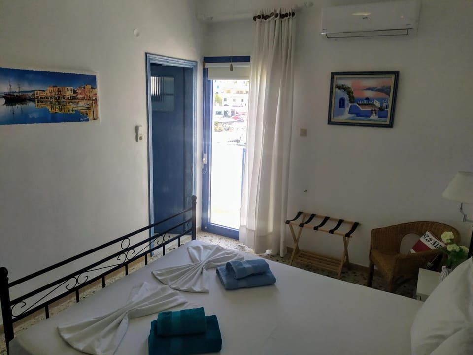 Bed, Photo of the whole room, Bedroom, towels, air conditioner