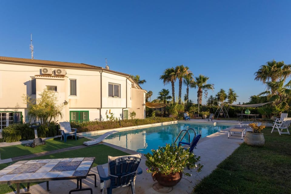 Property building, Living room, Swimming pool