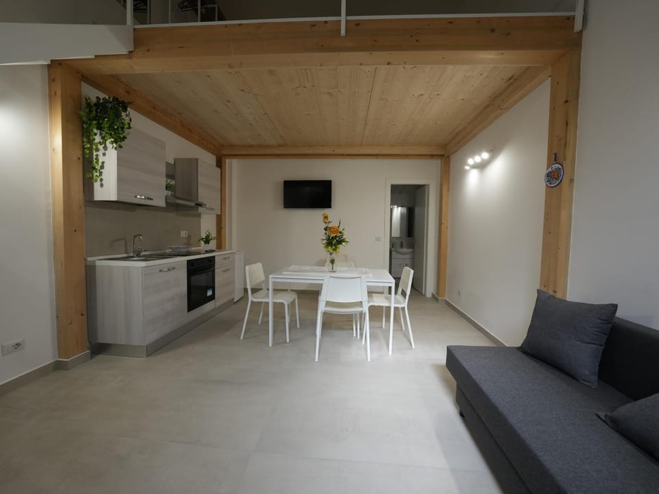 Kitchen or kitchenette, Living room, Seating area, Dining area