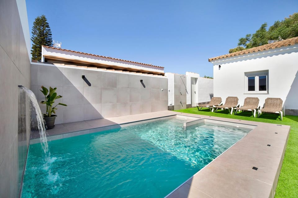 Property building, Living room, Swimming pool