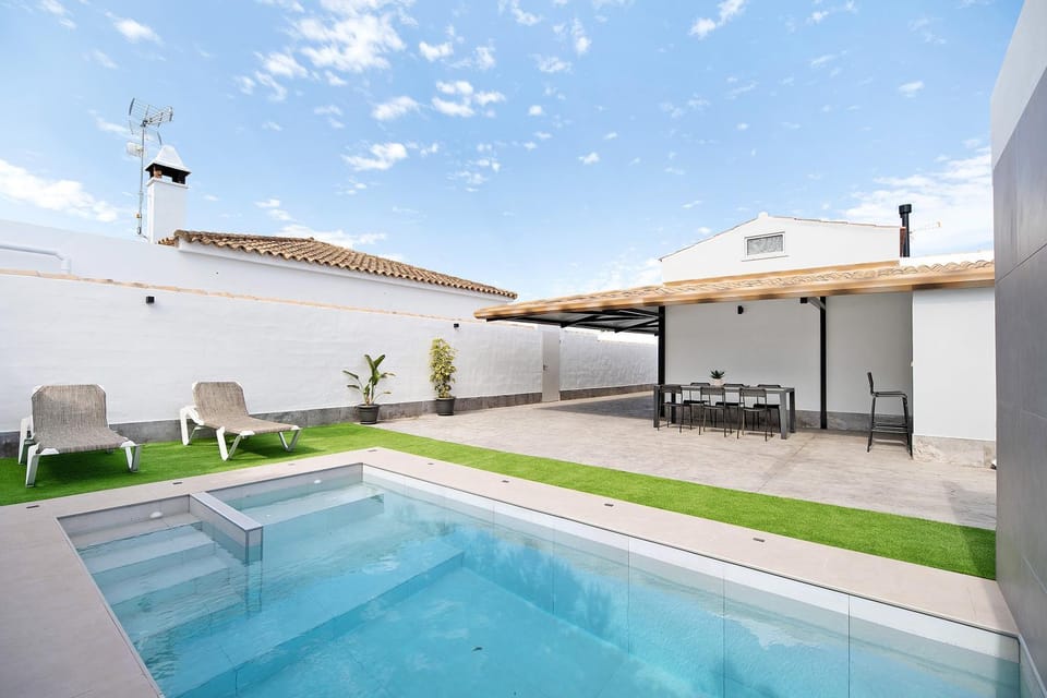 Property building, Living room, Swimming pool