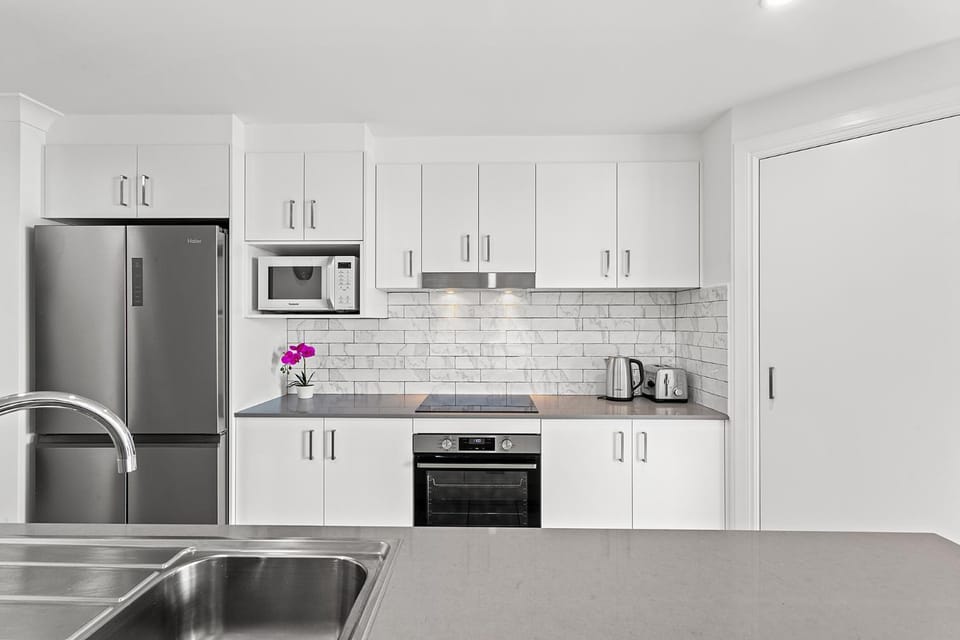 Kitchen or kitchenette, oven, stove, toaster