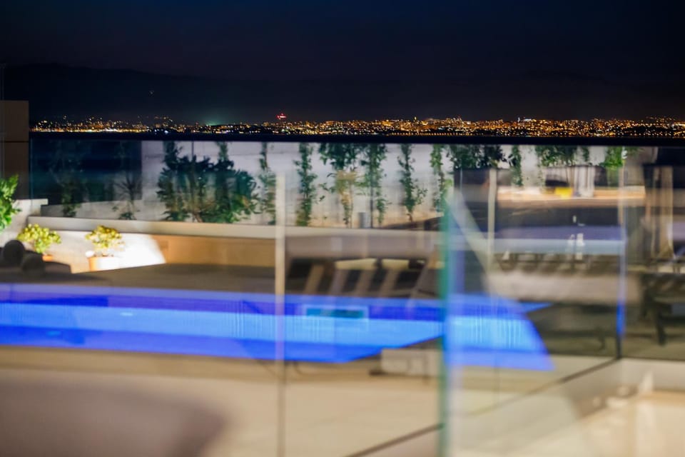 Night, View (from property/room), Balcony/Terrace, City view, Pool view, Swimming pool