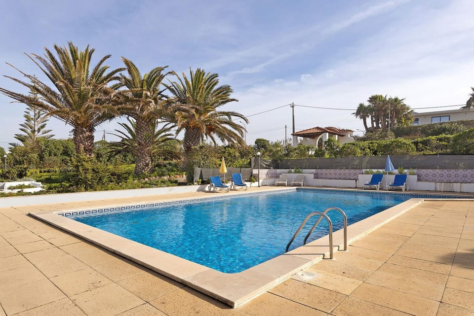 Property building, Living room, Swimming pool