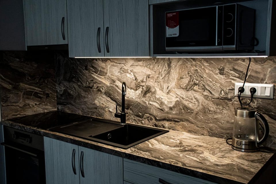 Kitchen or kitchenette, stove