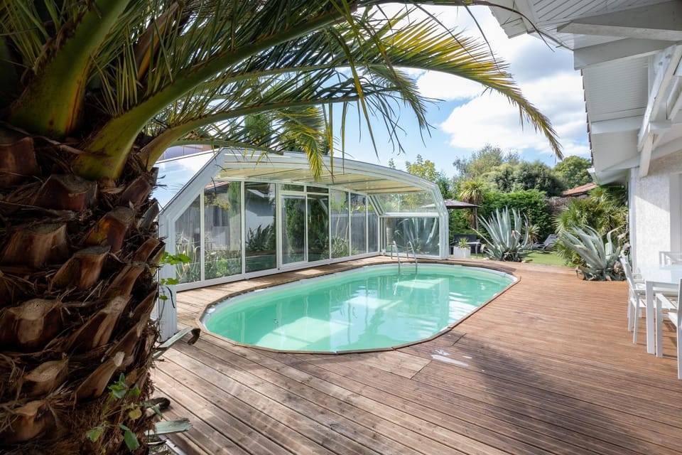 Property building, Living room, Swimming pool
