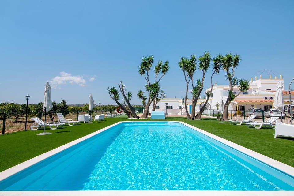Property building, Living room, Swimming pool