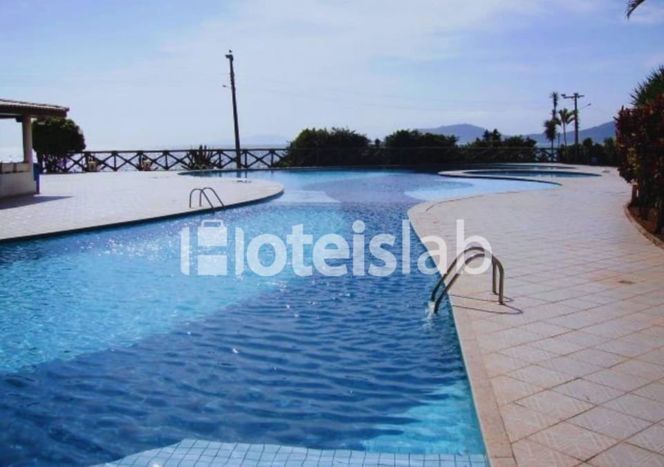 C148 Lindo apartamento em condomínio de frente para o mar Apartment in Florianopolis