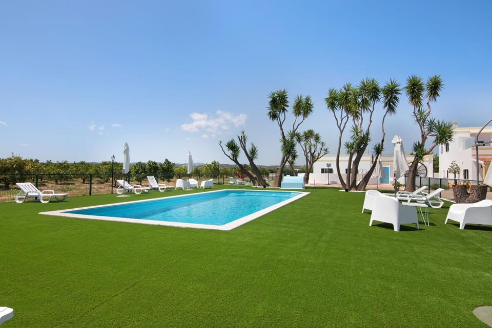 Property building, Living room, Swimming pool