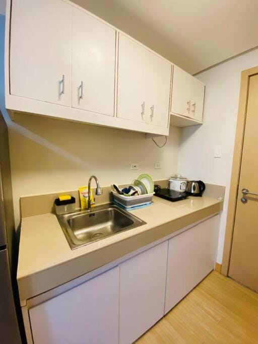 Trees Residences Staycation Evol's Place Apartment in Quezon City