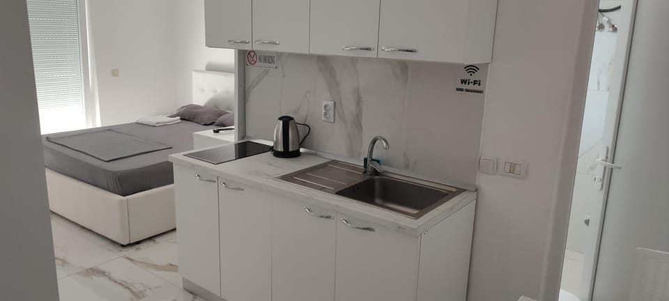 Kitchen or kitchenette, stove