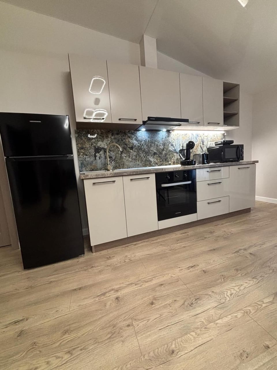 Kitchen or kitchenette, oven, stove