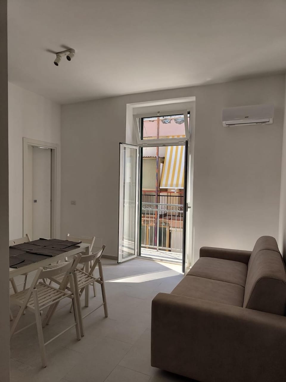 Living room, Seating area, Dining area, air conditioner