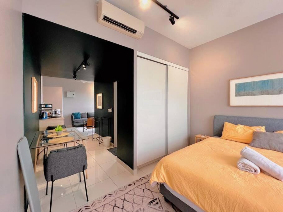Bed, Living room, Photo of the whole room, Seating area, Bedroom, towels, wardrobe, air conditioner