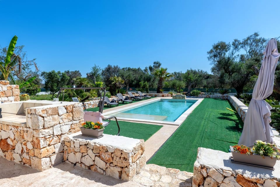 Property building, Living room, Swimming pool