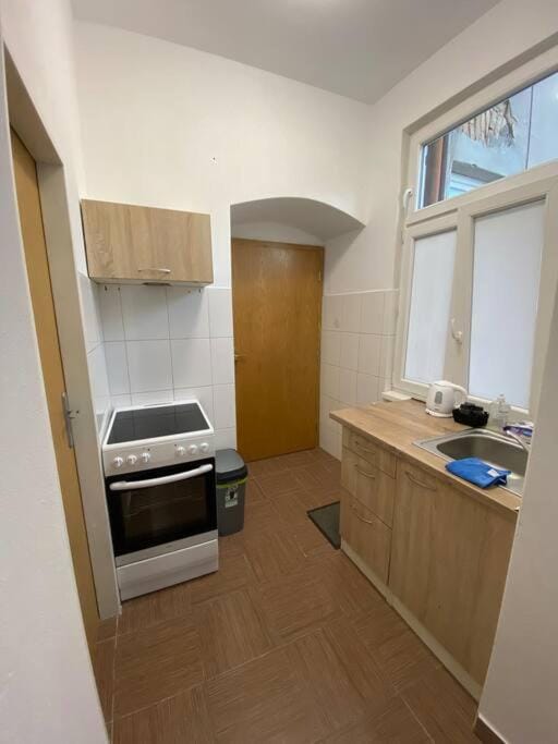Kitchen or kitchenette, oven, stove