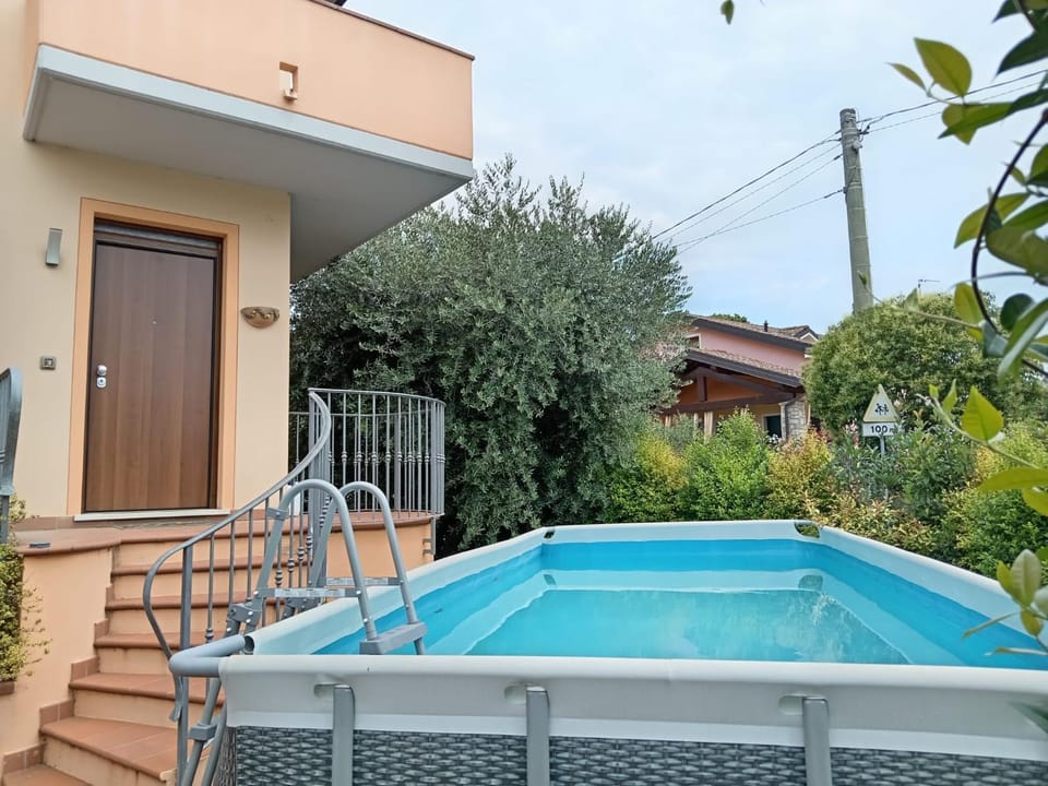 Facade/entrance, Day, Balcony/Terrace, Pool view, Swimming pool