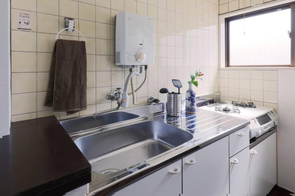 Kitchen or kitchenette, stove