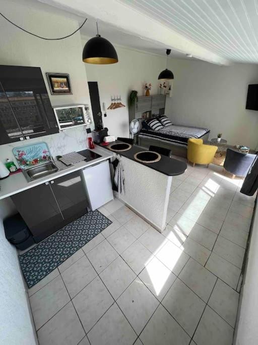 Kitchen or kitchenette, microwave, stove