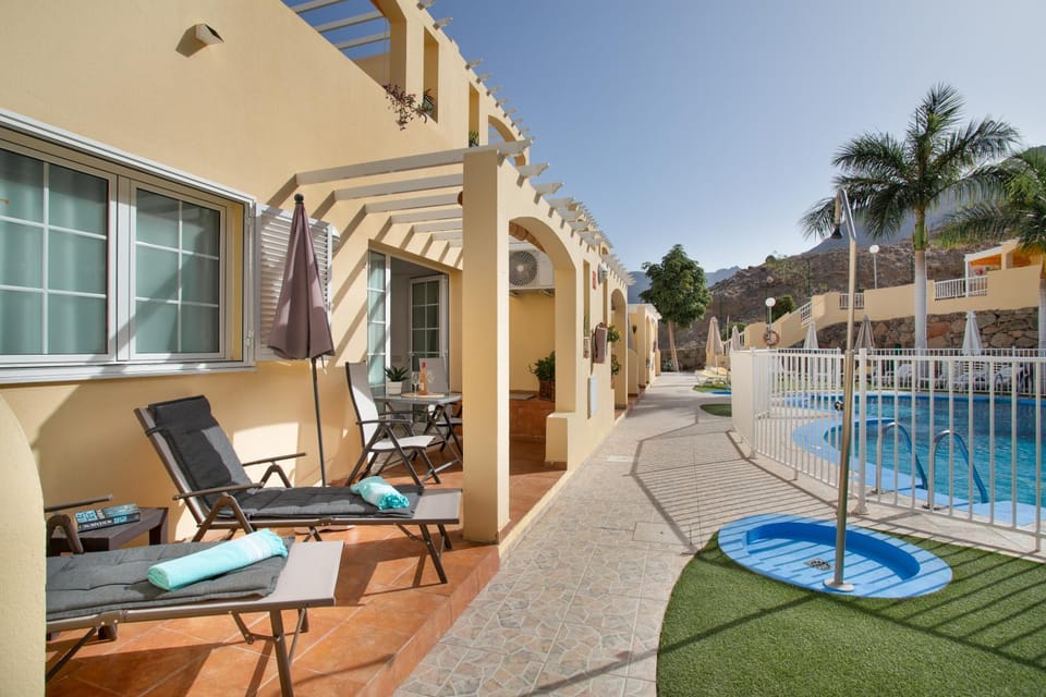 Property building, Living room, Swimming pool