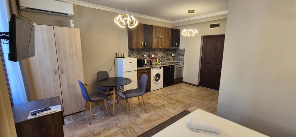 Kitchen or kitchenette, Dining area, oven, stove, wardrobe