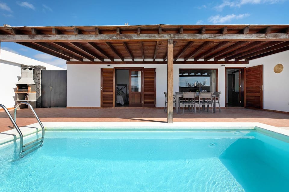 Property building, Living room, Swimming pool