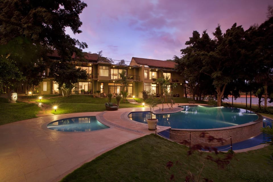 Property building, Facade/entrance, Night, Bird's eye view, Garden, On site, Garden view, Pool view, River view, Swimming pool, Sunset