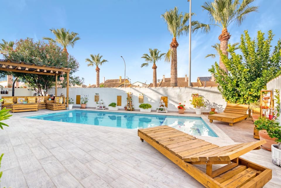 Property building, Living room, Swimming pool