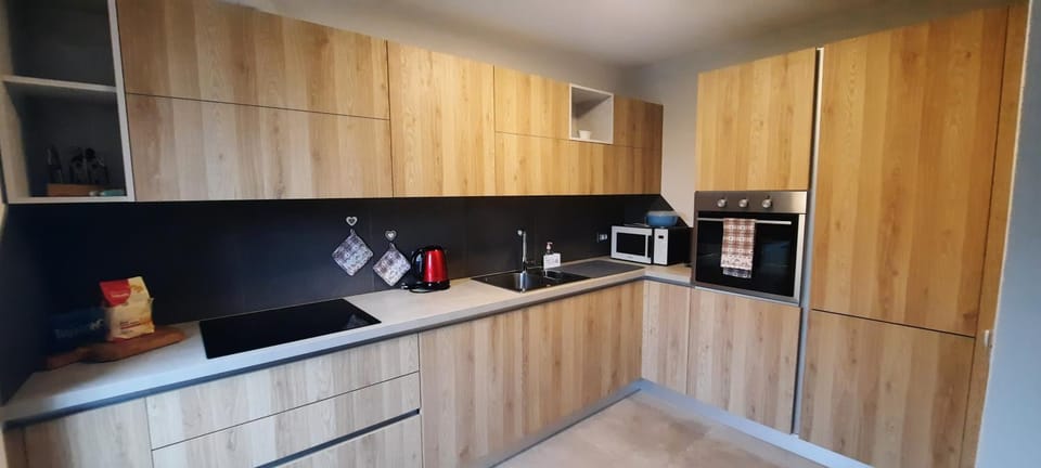 Kitchen or kitchenette, microwave, oven, kitchen