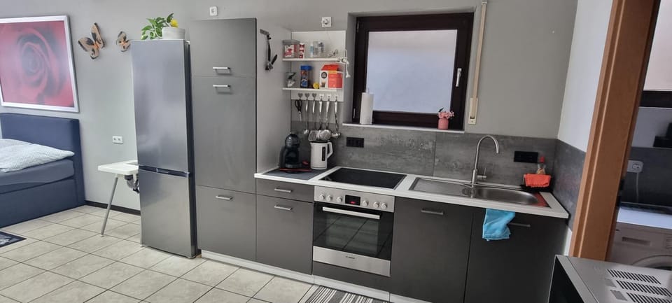 Kitchen or kitchenette, oven, stove