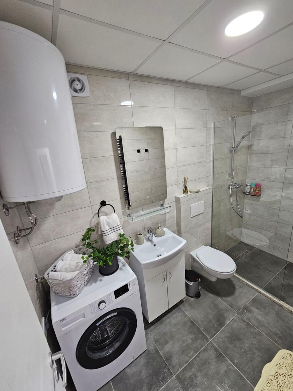 Shower, Toilet, Bathroom, towels, washing machine, dryer