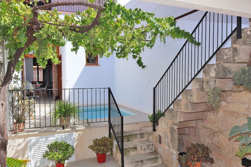 Property building, Patio, Facade/entrance, Off site, Day, Balcony/Terrace, Pool view, Swimming pool
