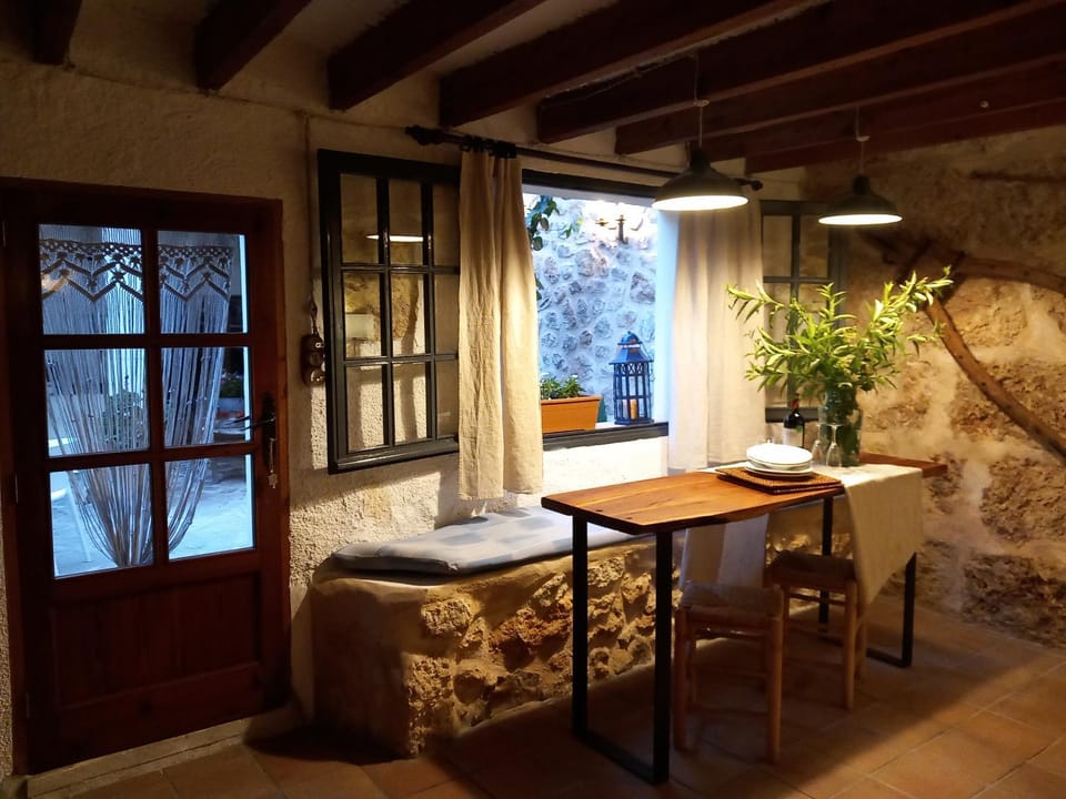 View (from property/room), Living room, Seating area, Dining area, Inner courtyard view