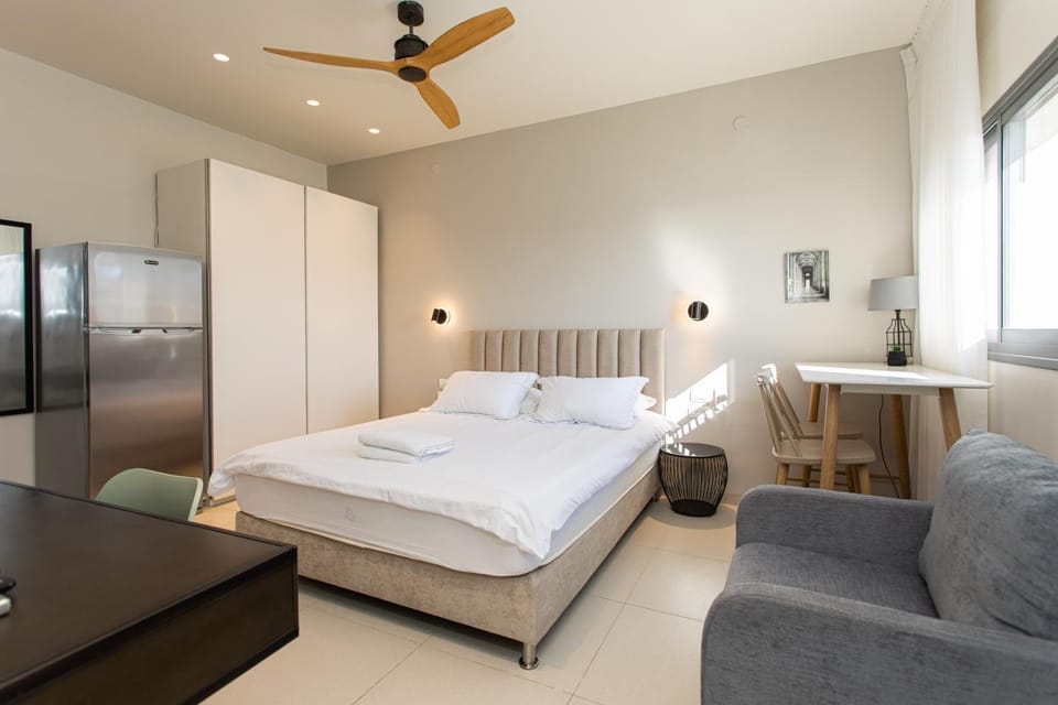 Bed, Living room, Seating area